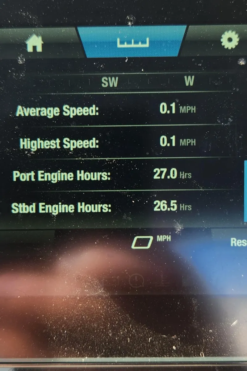 Slide: The Image of Dashboard display of 2023 Yamaha Boats SX220 showing speed and engine hours. - 12
