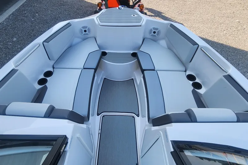 Slide: The Image of 2023 Yamaha Boats SX220 interior with spacious seating and modern design. - 8