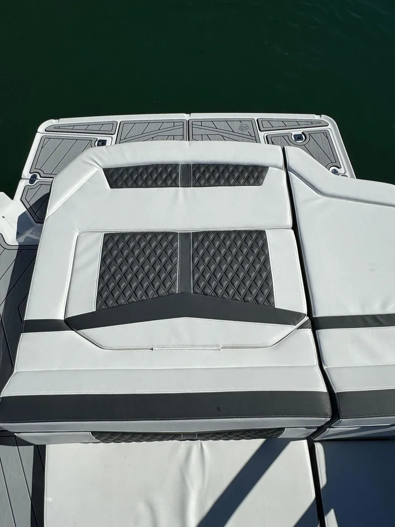 Slide: The Image of 2024 Monterey 218SS boat with stylish gray and white seating design. - 16