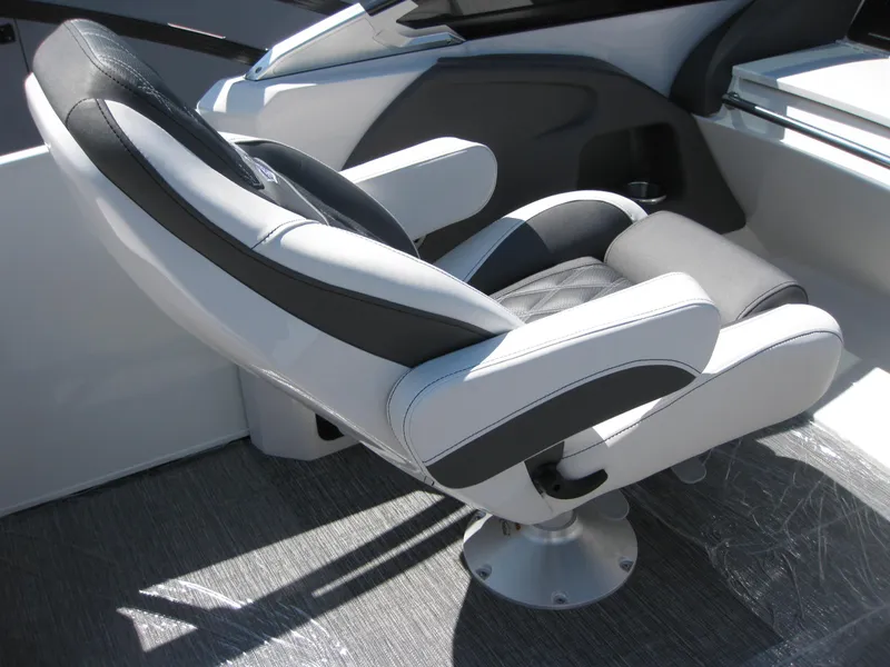 Slide: The Image of Luxury seating in 2024 Bennington 25RX Swingback Windshield boat, featuring sleek design and comfort. - 19