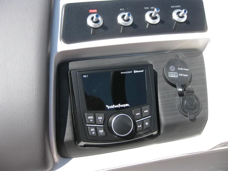 Slide: The Image of Control panel of 2024 Bennington 25RX Swingback Windshield with Rockford Fosgate audio system. - 23