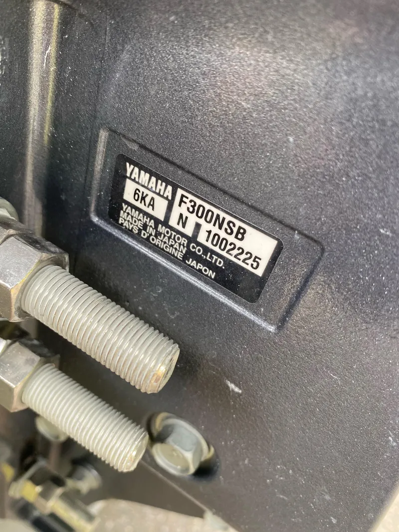 Slide: The Image of Yamaha F300NSB engine on 2021 Cobia 240 Center Console boat. - 9