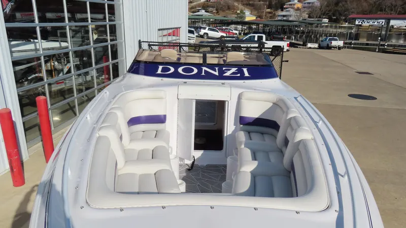 Slide: The Image of 2003 Donzi 28 ZX Open boat with spacious seating and sleek design. - 29