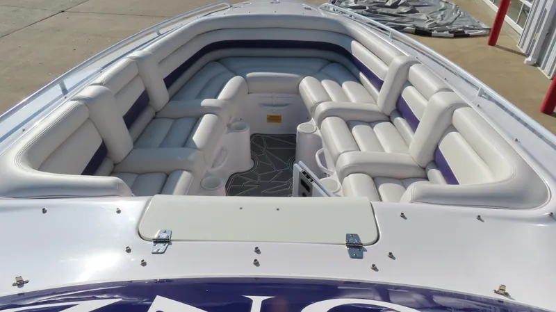 Slide: The Image of 2003 Donzi 28 ZX Open boat interior with white cushioned seating. - 32