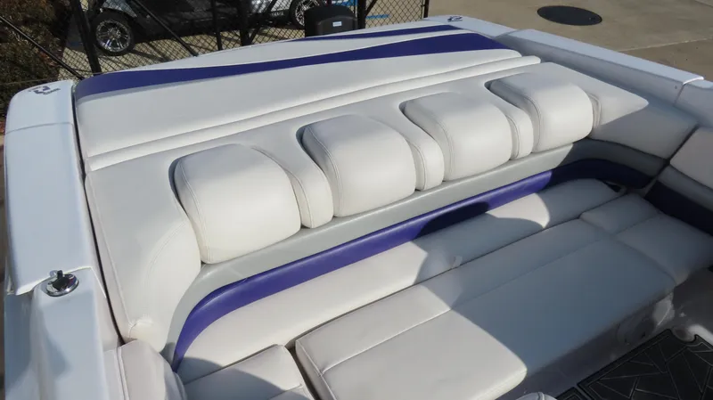 Slide: The Image of 2003 Donzi 28 ZX Open boat interior with white and purple seating. - 39