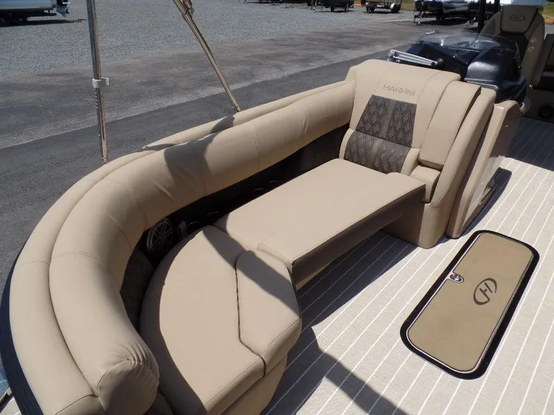 Slide: The Image of 2021 Harris Solstice 250 SL boat with luxurious beige seating and stylish interior design. - 10