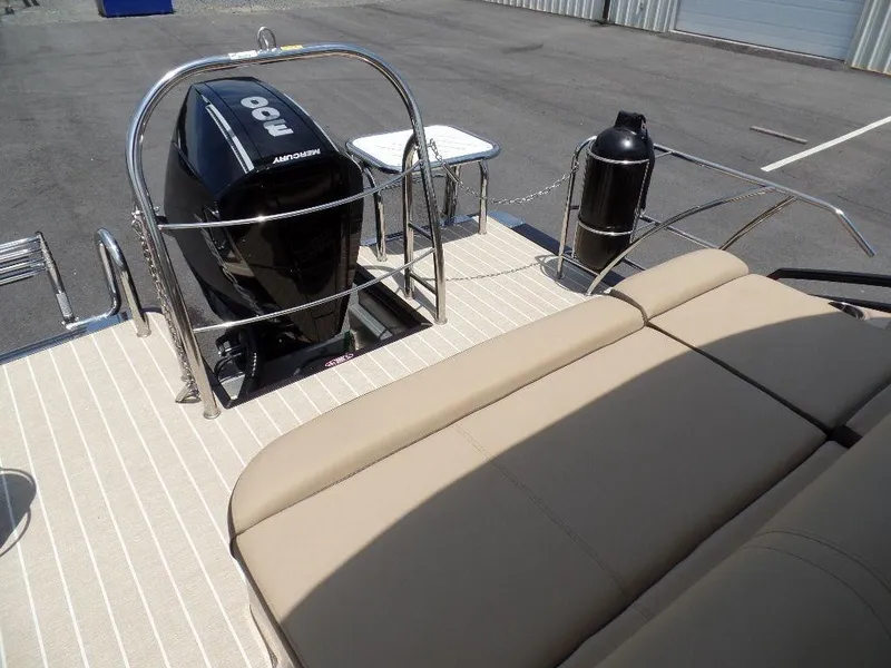Slide: The Image of 2021 Harris Solstice 250 SL boat with Mercury Pro motor and beige seating. - 11