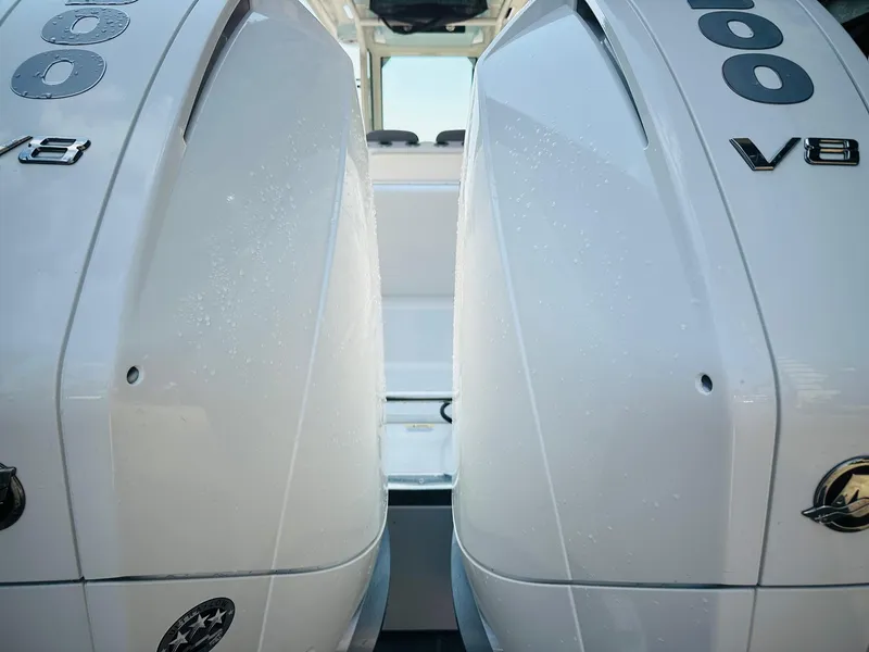 Slide: The Image of Twin V8 engines on a 2024 Caymas 281 HB boat. - 10