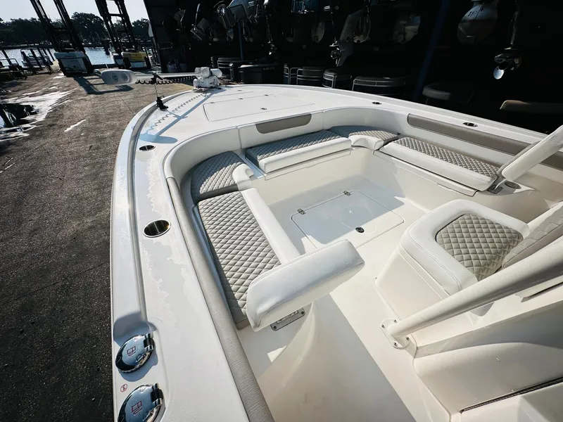 Slide: The Image of 2024 Caymas 281 HB boat with spacious seating and sleek design. - 27