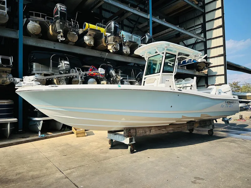 Slide: The Image of 2024 Caymas 281 HB boat in storage, showcasing sleek design and modern features. - 5