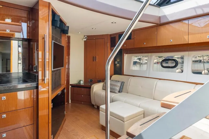 Slide: The Image of Luxurious interior of 2015 Sea Ray 510 Sundancer yacht with modern furnishings and sleek design. - 22