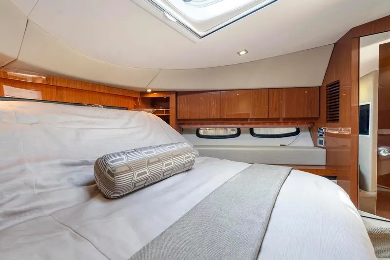 Slide: The Image of Luxurious cabin interior of 2015 Sea Ray 510 Sundancer yacht with elegant wood finishes. - 35