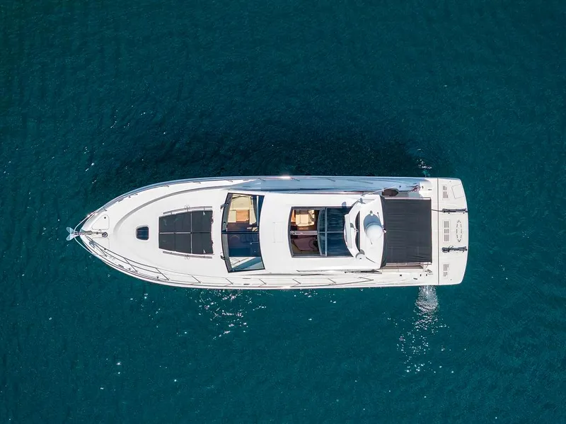 Slide: The Image of Aerial view of 2015 Sea Ray 510 Sundancer yacht on blue water. - 7