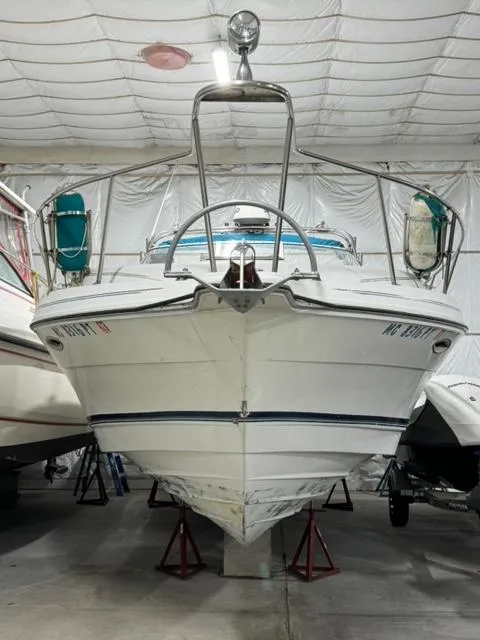 Slide: The Image of 1993 Rinker 280 Fiesta Vee boat in storage, front view. - 4
