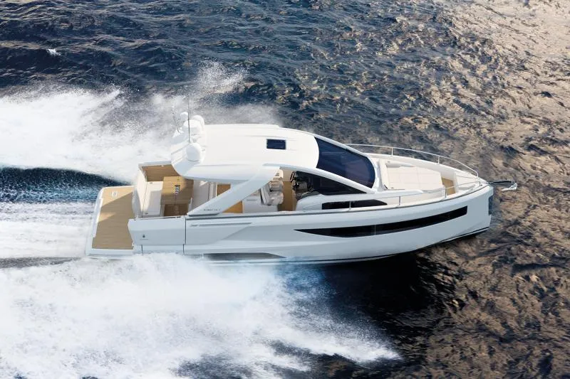 The Image of 2024 Jeanneau DB37 yacht cruising swiftly on open water. - 0