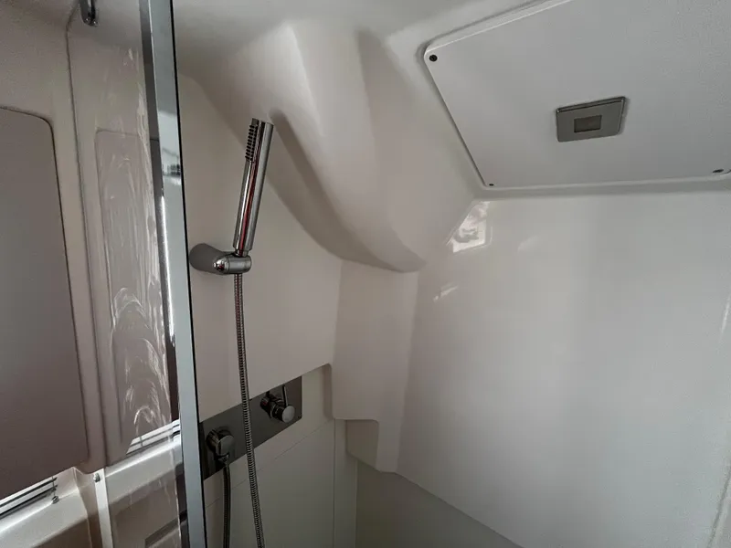 Slide: The Image of 2024 Jeanneau DB37 yacht interior shower area with modern fixtures. - 25