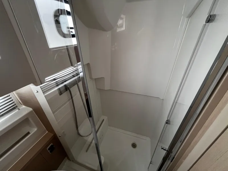 Slide: The Image of 2024 Jeanneau DB37 yacht bathroom with modern shower and sleek design. - 26