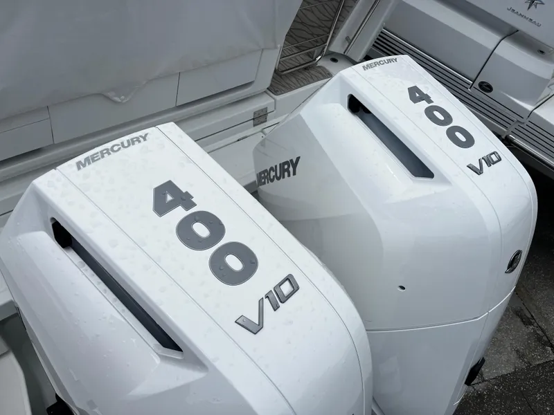 Slide: The Image of Twin Mercury 400 V10 outboard engines on a 2024 Jeanneau DB37 boat. - 5