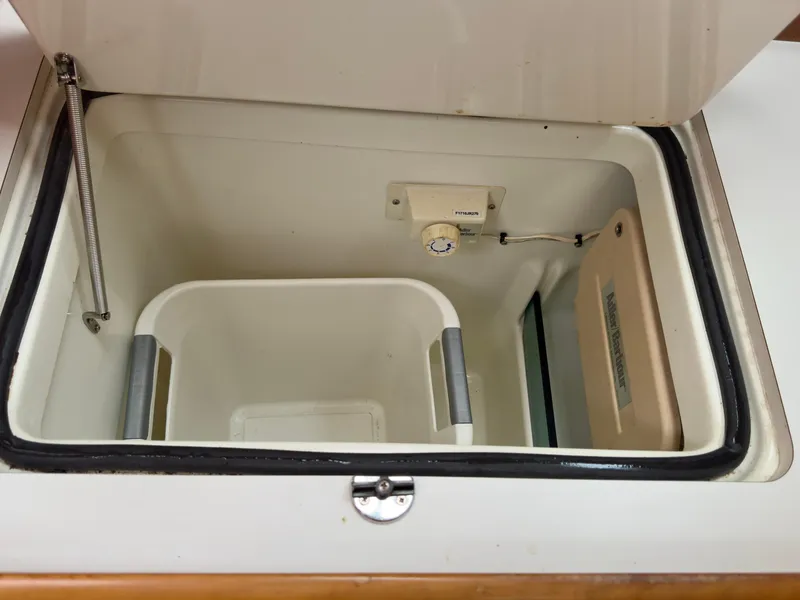 Slide: The Image of Open storage compartment on 2001 Beneteau Oceanis 331 sailboat. - 13