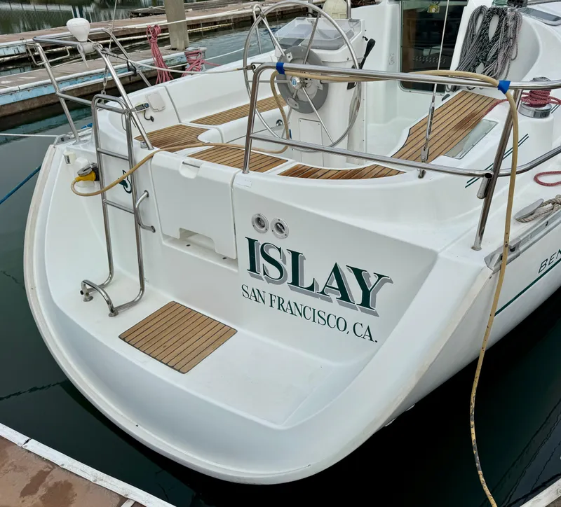 Slide: The Image of 2001 Beneteau Oceanis 331 sailboat docked, named "Islay," San Francisco, CA. - 2