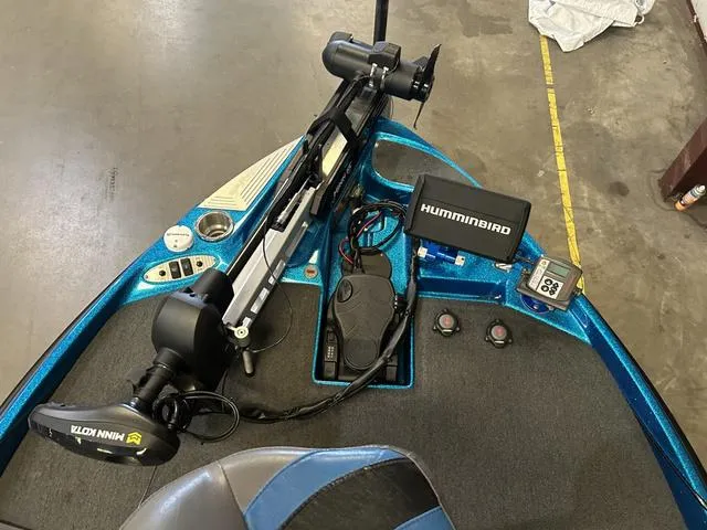 Slide: The Image of 2018 Bass Cat Lynx boat interior with Humminbird electronics and Minn Kota trolling motor. - 7