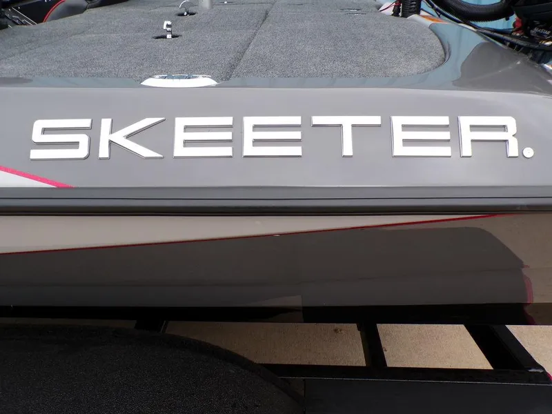 Slide: The Image of 2025 Skeeter ZXR21 boat deck with logo in focus. - 12