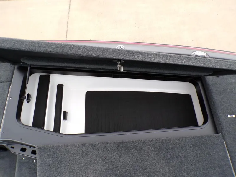 Slide: The Image of Storage compartment of 2025 Skeeter ZXR21 boat, featuring a sleek, organized interior design. - 18