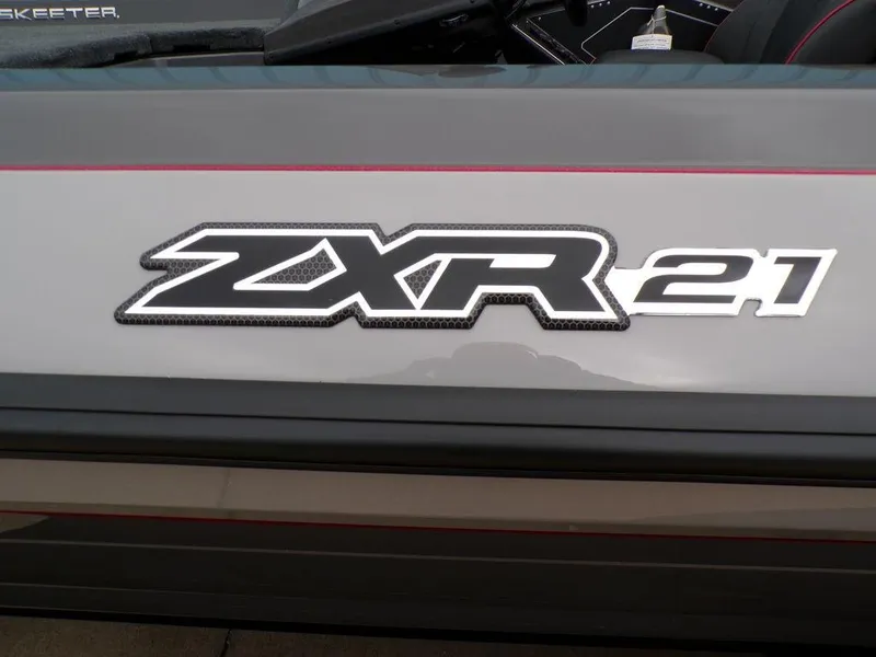 Slide: The Image of 2025 Skeeter ZXR21 logo on a sleek gray surface. - 3