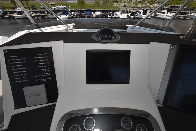 Slide: The Image of Cockpit view of 1997 Viking 50 Convertible yacht with navigation instruments. - 6