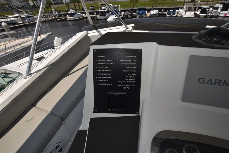 Slide: The Image of Control panel on 1997 Viking 50 Convertible yacht at marina. - 8