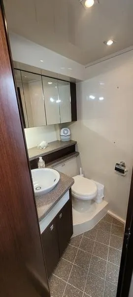 Slide: The Image of Luxurious bathroom in 2011 Cruisers Yachts 48 Cantius with modern fixtures and elegant design. - 10