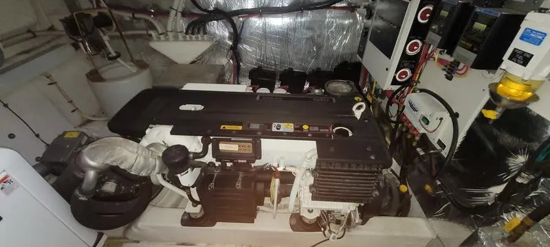 Slide: The Image of Engine room of 2011 Cruisers Yachts 48 Cantius with visible machinery and components. - 17