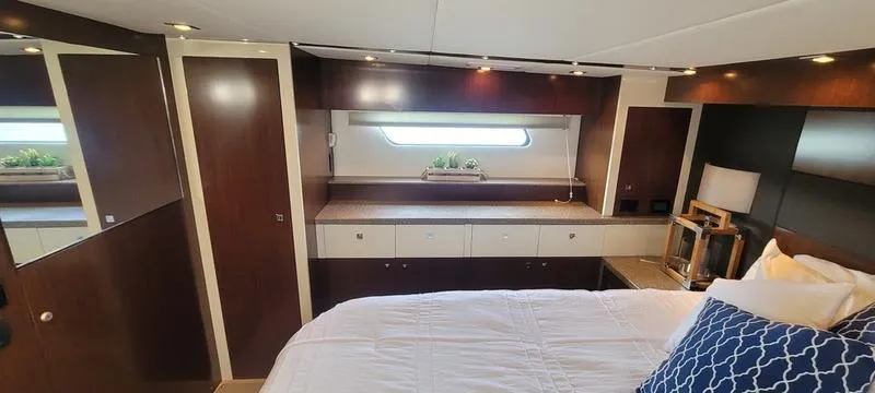 Slide: The Image of Luxurious bedroom interior of 2011 Cruisers Yachts 48 Cantius with modern decor and natural light. - 22
