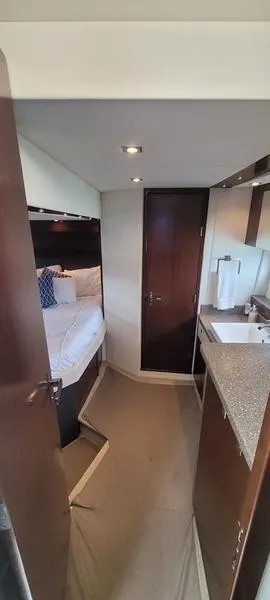 Slide: The Image of Interior cabin of 2011 Cruisers Yachts 48 Cantius with bed and sink. - 28