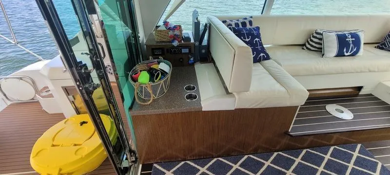 Slide: The Image of Luxurious 2011 Cruisers Yachts 48 Cantius interior with elegant seating and nautical decor. - 3