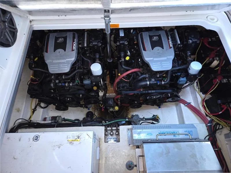 Slide: The Image of 2009 Chaparral 310 Signature engine compartment with dual engines and wiring. - 32