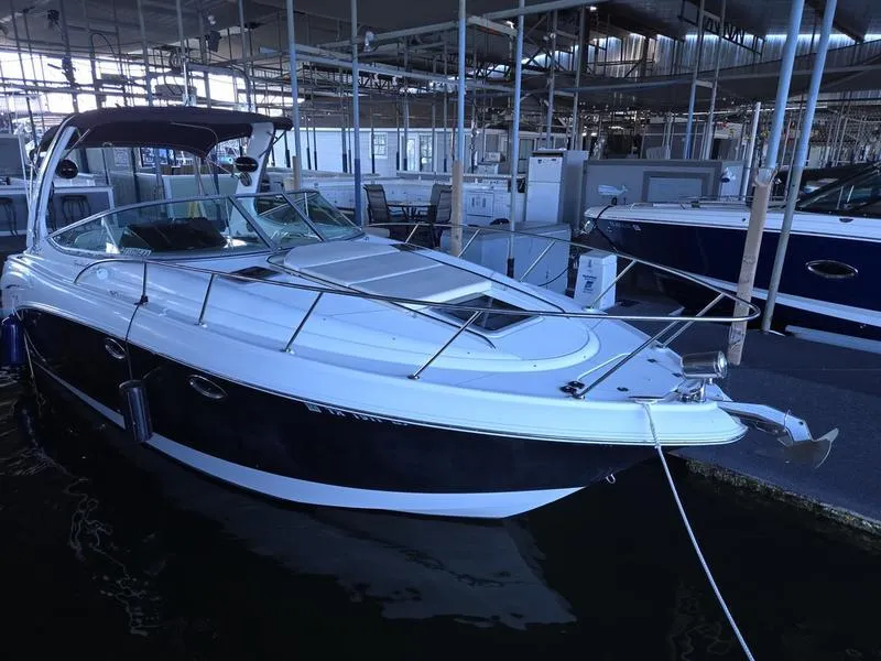 Slide: The Image of 2009 Chaparral 310 Signature boat docked in marina. - 6