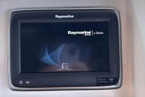 Slide: The Image of Raymarine aSeries display on 2001 Carver 356 Motor Yacht dashboard. - 9