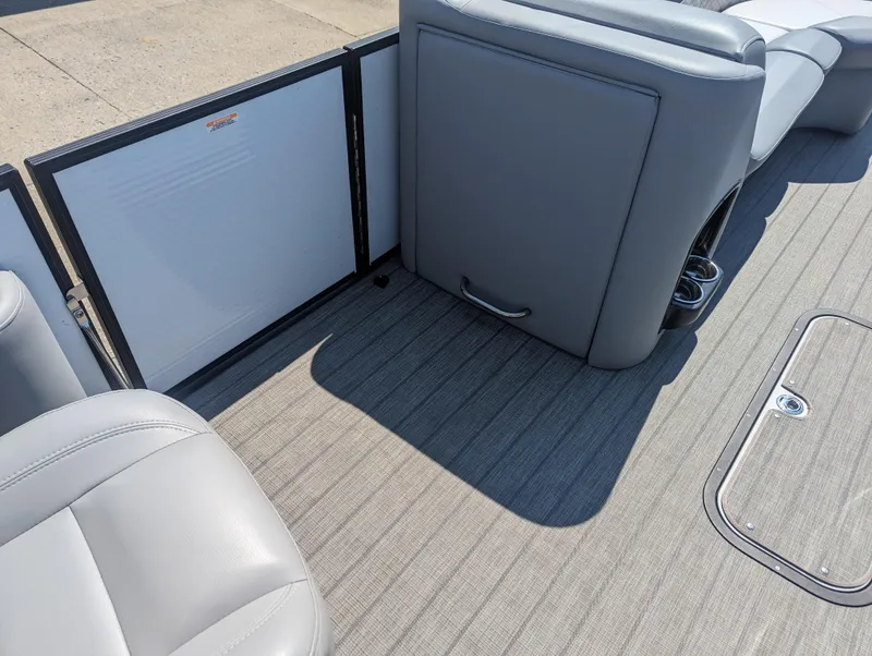 Slide: The Image of 2022 Manitou Encore 25 RF interior with gray seating and flooring. - 29