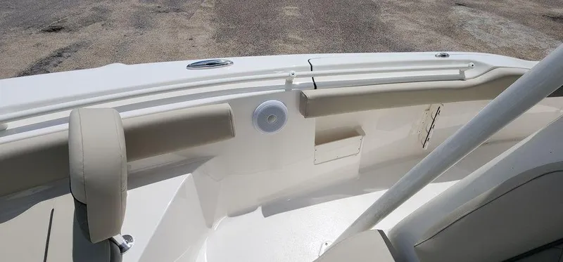 Slide: The Image of 2025 Key West 239 FS boat interior with seating and speaker. - 17