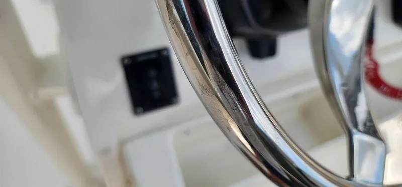 Slide: The Image of Close-up of a 2025 Key West 239 FS boat steering wheel. - 35