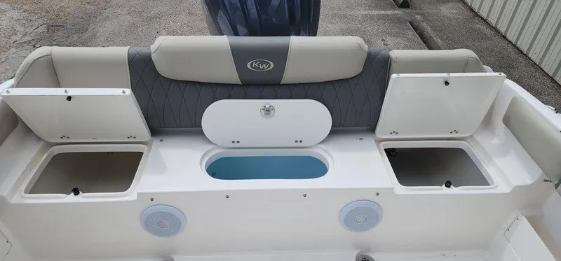Slide: The Image of 2025 Key West 239 FS boat interior with storage compartments and seating. - 43