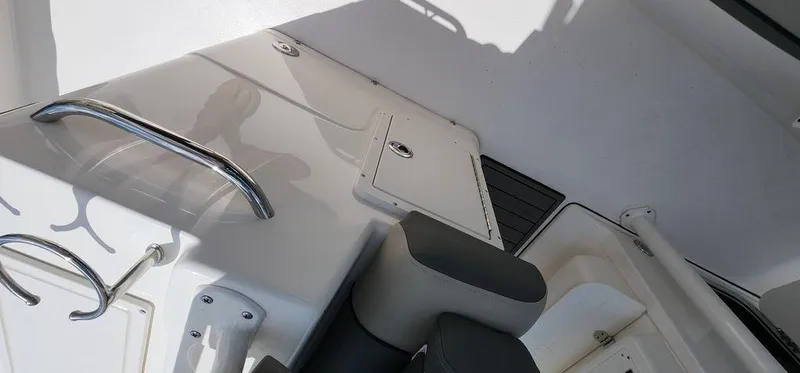 Slide: The Image of Interior view of 2025 Key West 239 FS boat, featuring seating and storage compartments. - 47