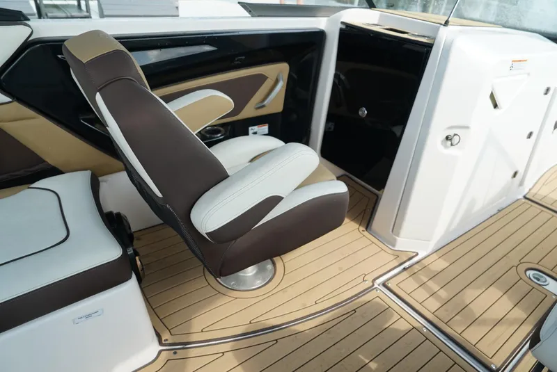 Slide: The Image of 2021 Yamaha Boats 252SE interior with sleek seating and modern design. - 15