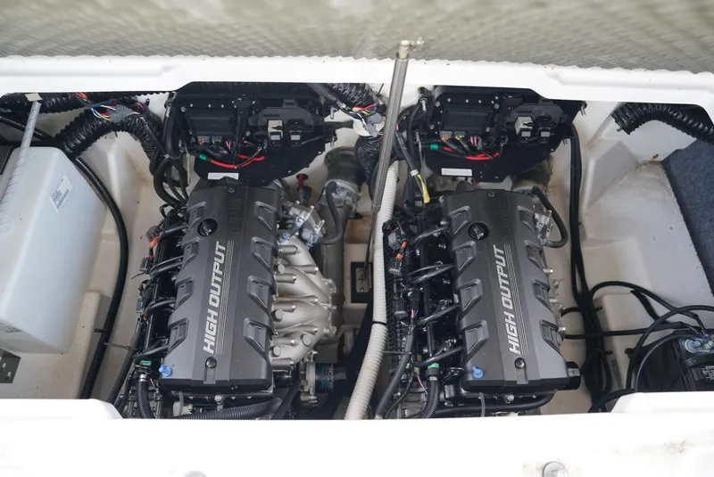 Slide: The Image of 2021 Yamaha Boats 252SE engine compartment with dual high-output engines. - 25