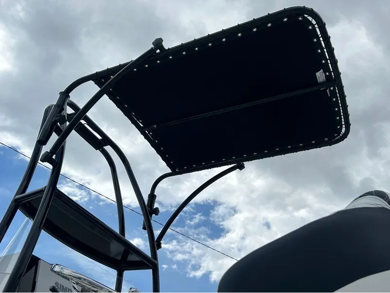 Slide: The Image of Tidewater 25 TPC Raptor 2025 boat canopy against cloudy sky. - 14
