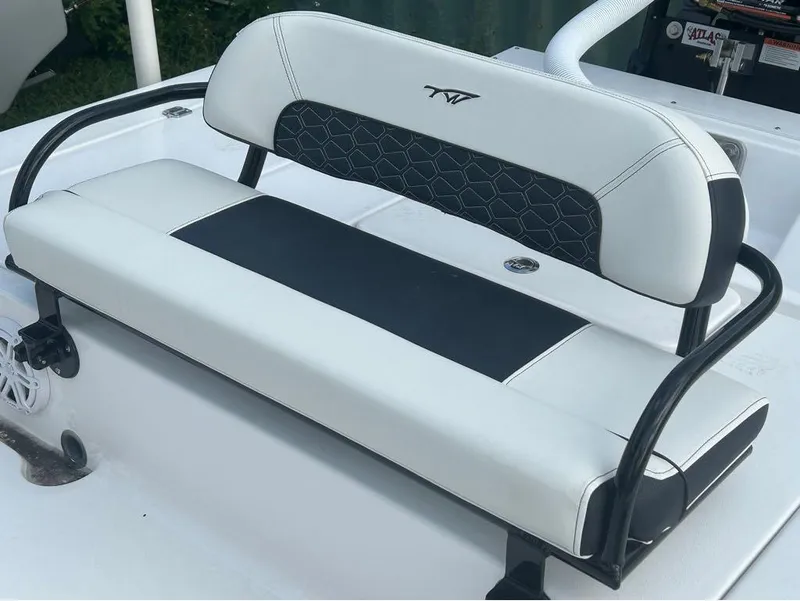Slide: The Image of 2025 Tidewater 25 TPC Raptor boat seat with black and white upholstery. - 18