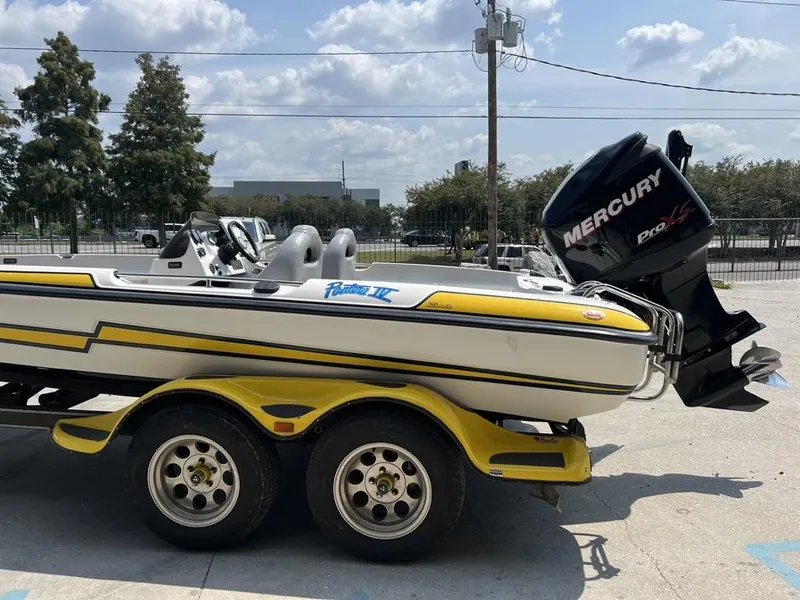 Slide: The Image of 2010 Bass Cat Pantera IV boat with Mercury Pro XS engine on trailer. - 3