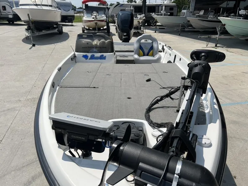 Slide: The Image of 2010 Bass Cat Boats Pantera IV with Garmin equipment, parked in a marina. - 5