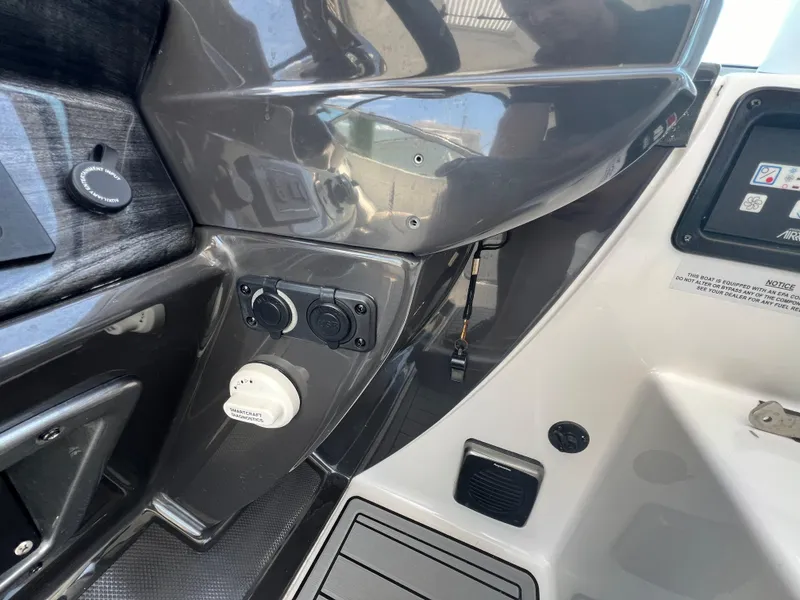 Slide: The Image of 2017 Monterey 355 Sport Yacht dashboard with controls and diagnostic ports. - 24